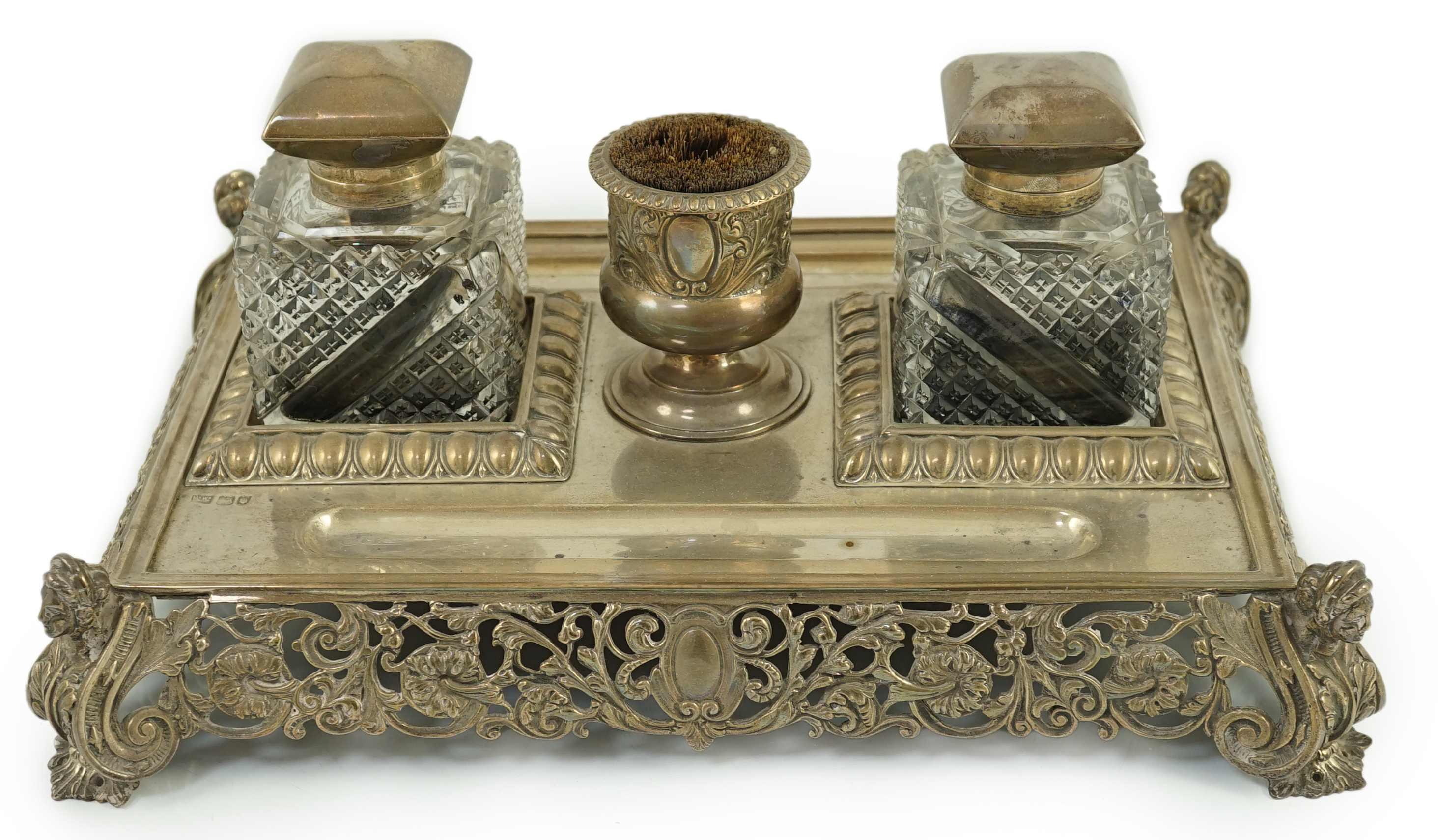 An ornate Edwardian silver rectangular inkstand, by Mappin & Webb